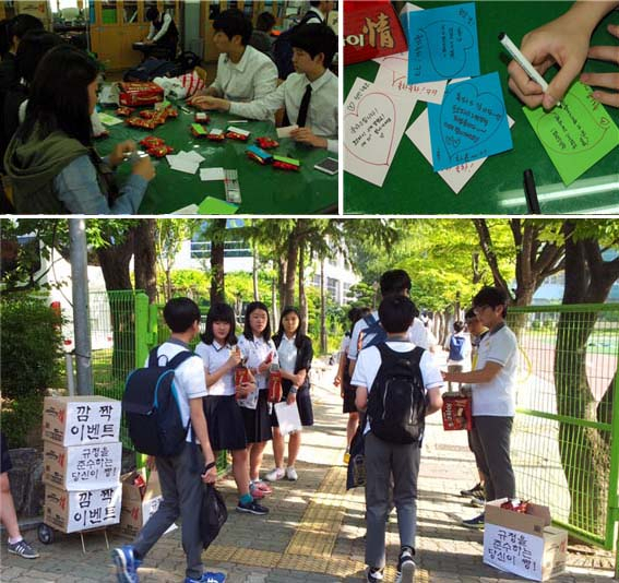 대구 동중학교 학생회 대의원들이 등굣길 칭찬문화를 만들기 위해 규정을 준수해 등교하는 학생들에게 초코파이를 나눠주는 깜짝 이벤트를 갖고 있다.