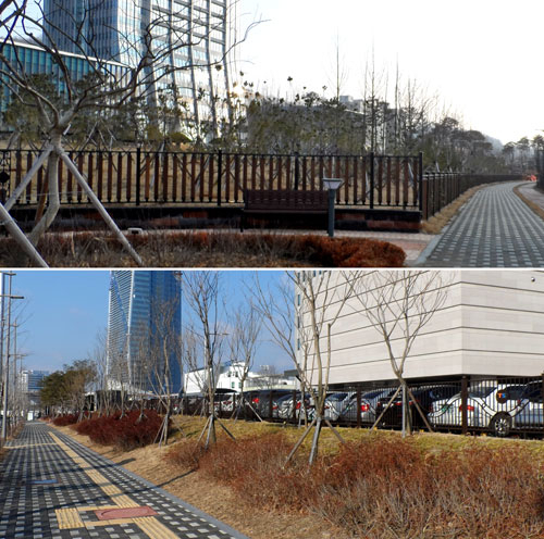 김천혁신도시 내 한국도로공사 담장(사진 위)이 한 치의 땅도 양보 못 한다는 듯 인도와 바로 맞물려 세워져 있다. 지구단위계획상 \