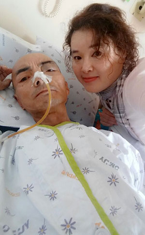 이욱기(왼쪽) 씨가 세상을 떠나기 전 이인자(53) 씨와 함께 찍은 사진. 인자 씨는 