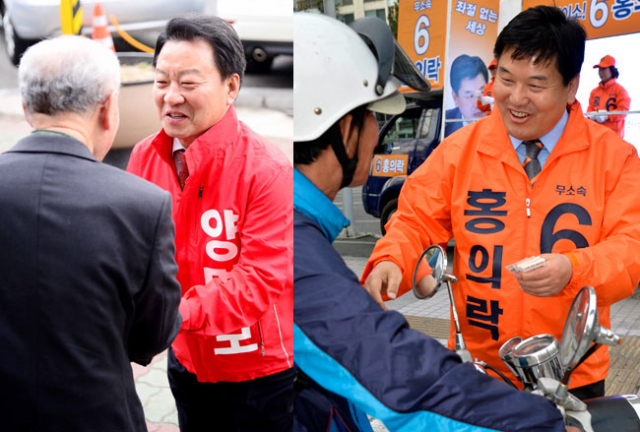 대구 북을에 출마한 새누리당 양명모 후보가 3일 오후 북구 한 교회를 찾아 유권자에게 지지를 호소하고 있다.(왼쪽 사진) 김영진 기자 kyjmaeil@msnet.co.kr 무소속 홍의락 후보가 2일 홈플러스 칠곡점 앞에서 유권자에게 다가가 지지를 호소하고 있다.(오른쪽 사진) 우태욱 기자 woo@msnet.co.kr