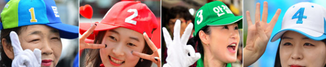 19대 대통령 선거전이 중반전으로 접어들면서 치열한 양상을 보이고 있다. 21일 대구 시내 거리 곳곳에서 유세 차량 앞에 선 각 당의 선거운동원들이 모자와 손가락으로 후보의 기호를 알리며 유권자들을 향해 지지를 부탁하고 있다. 정운철 기자 woon@msnet.co.kr 성일권 기자 sungig@msnet.co.kr