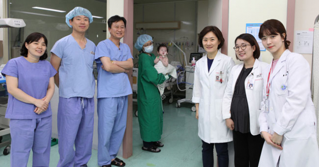 대구경북 최초로 생후 8개월 영아의 심장 이식 수술에 성공한 경북대병원 의료진