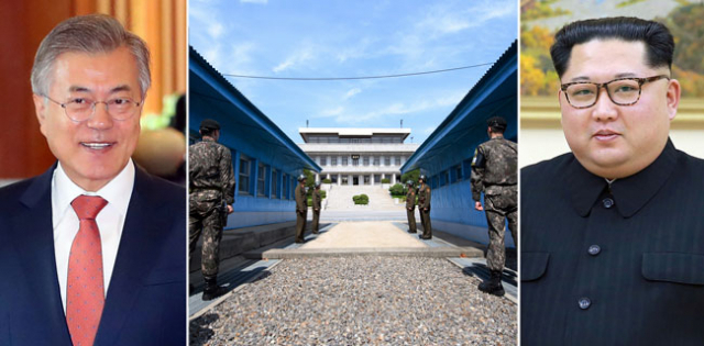 남북 정상회담을 하루 앞둔 26일 오후 경기도 파주 판문점 공동경비구역 내 T2와 T3 사이 군사분계선 앞에서 우리 측과 북한 측 경비병이 경계근무를 서고 있다.(가운데) 27일 문재인 대통령과 김정은 북한 국무위원장은 여기서 처음 만나 한반도의 새로운 미래를 논의할 예정이다. 연합뉴스