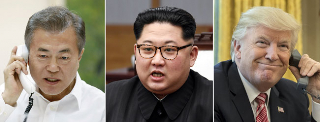 문재인 대통령이 28일 밤 청와대에서 도널드 트럼프 미국 대통령과 전화 통화를 하고 있다. 북한 김정은 국무위원장이 27일 파주 판문점 평화의집에서 문재인 대통령과 정상회담 중 발언하고 있는 모습(가운데). [청와대 제공·EPA연합뉴스]