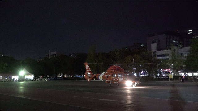 제주도에서 손목이 절단된 60대 환자가 수지접합 전문병원인 대구 W병원에서 무사히 수술을 받았다. 소방청 중앙119구조본부 헬기가 대구 두류공원에 도착한 모습. W병원 제공.