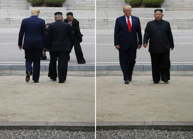 도널드 트럼프 미국 대통령과 북한 김정은 국무위원장이 30일 오후 판문점 군사분계선을 넘어 북측으로 함께 걸어갔다 다시 되돌아오고 있다. 연합뉴스