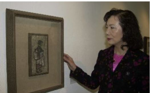2002년 10월 박수근 미술관에서 박화백의 장녀 인숙 씨가 13살때 남동생을 업고 있던 자신을 모델로 박 화백이 그린 작품 