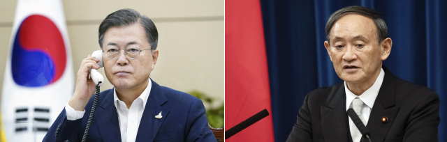 문재인 대통령이 24일 오전 청와대에서 스가 요시히데(菅義偉) 일본 총리와 전화 회담을 하고 있다. 연합뉴스