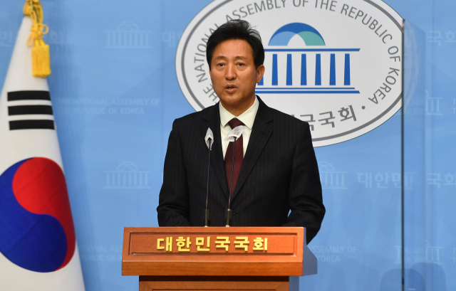 국민의힘 오세훈 서울시장 후보가 19일 오후 서울 여의도 국회 소통관에서 국민의당 안철수 후보와의 야권 단일화 관련 기자회견을 하고 있다. 연합뉴스