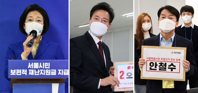 국민의힘 오세훈 서울시장 후보(가운데)와 국민의당 안철수 서울시장 후보(오른쪽)가 19일 서울 종로구 서울시선거관리위원회에서 각각 후보자 등록을 하고 있다. 전날 대리인을 통해 후보자 등록을 마친 더불어민주당 박영선 서울시장 후보가 19일 서울 종로구 캠프 사무실에서 