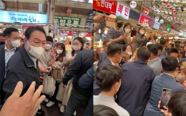 윤석열 대통령이 취임 첫 주말인 14일 부인 김건희 여사와 함께 서울 광장시장과 강남 신세계백화점을 찾아 쇼핑을 했다. 연합뉴스