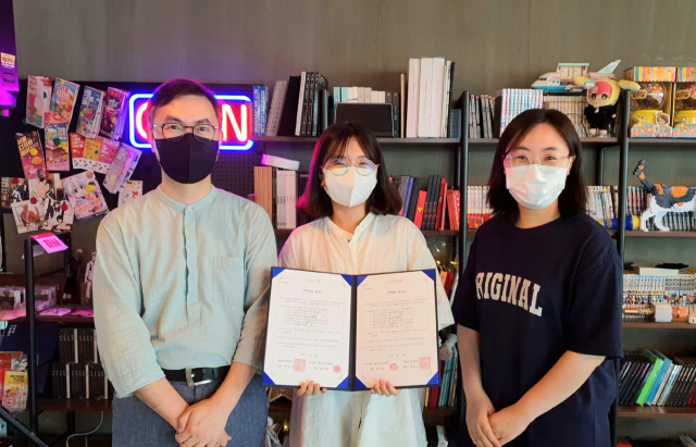 계명문화대 웹툰과와 (주)레드피치스튜디오의 산학협력 협약 체결 모습. 계명문화대 제공