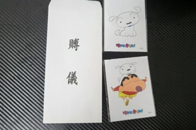 롯데제과가 제품에 불만을 표시한 고객에게 보낸 부의 봉투. 연합뉴스