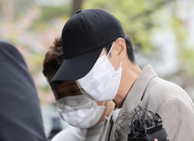 남의 차를 몰다가 잠들고 음주측정을 거부한 혐의로 재판에 넘겨진 그룹 신화 멤버 신혜성. 연합뉴스