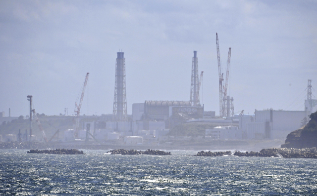 일본이 국내외에서 제기되는 반대를 무릅쓰고 24일 오후 1시께 후쿠시마 제1원자력발전소 오염수(일본 정부 명칭 '처리수')의 해양 방류를 시작했다. 사진은 이날 촬영된 후쿠시마현 나미에 소재 후쿠시마 제1원자력발전소의 모습. 연합뉴스