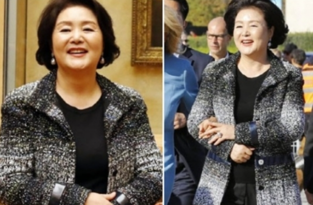 문재인 전 대통령 부인 김정숙 여사가 샤넬 제작 한글 재킷을 걸치고 있다. 연합뉴스