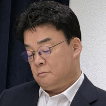 주총 참석한 백종원 
