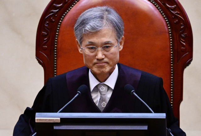 조희대 대법원장이 1일 서울 서초구 대법원에서 열린 더불어민주당 이재명 대선 후보의 공직선거법 위반 사건 상고심 선고에 참석, 입술을 다물고 있다. 연합뉴스