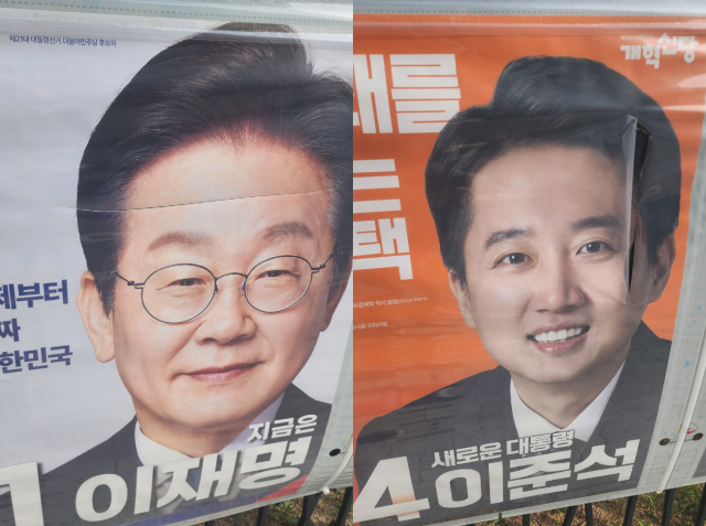18일 경북 안동시 옥동의 한 아파트 단지에서 이재명 대선 후보와 이준석 대선 후보의 벽보가 훼손된 모습. 전종훈 기자