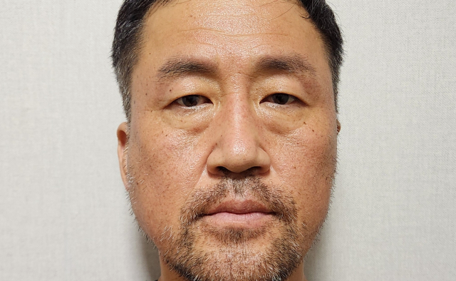 '스토킹 여성 살해' 윤정우 구속 송치