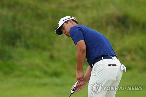 디오픈 1라운드에서 퍼팅하는 김주형. 로이터=연합뉴스