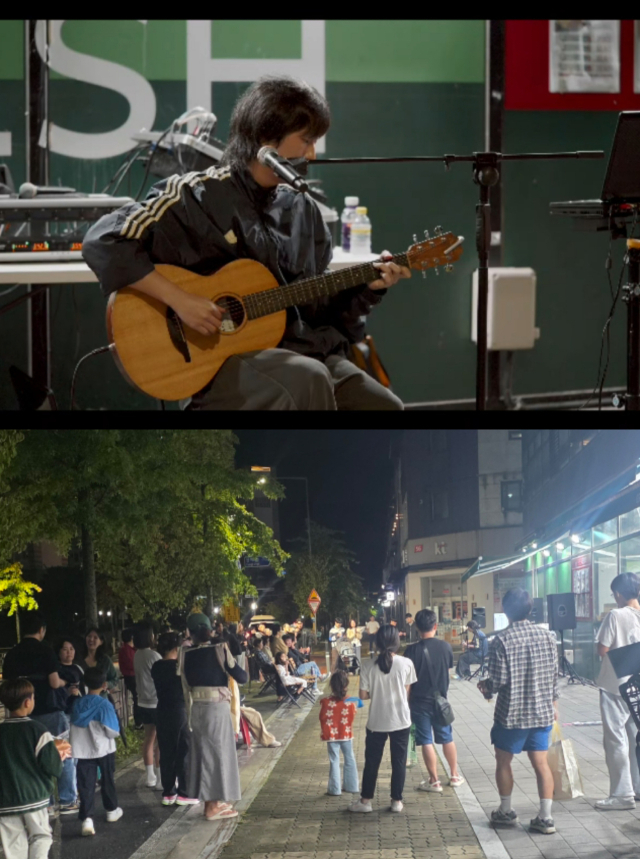 지난 7일 경북도청 신도시 일원에서 열린 버스킹 무대에 오른 가수 이종서가 노래를 하고 있다. 공연 소식을 접한 주민들이 자연스레 모여 그의 노래를 감상하고 있다. 윤영민 기자