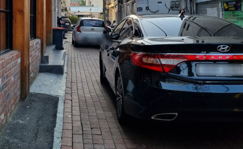 무단주차 한 시민이 1만6천대 신고…단속 체계 실효 논란