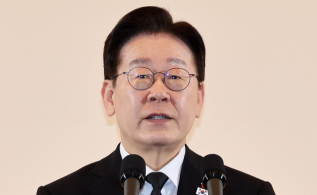 李정부 첫 통일교재 