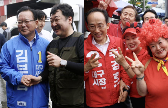 김부겸 더불어민주당 대구시장 후보가 27일 대구 농수산물도매시장에서 한 상인과 기념사진을 찍고 있다. (왼쪽)/ 추경호 국민의힘 대구시장 후보가 27일 대구 관문시장에서 선거운동원들과 함께 기념사진을 찍고 있다. 김영진 기자 kyjmaeil@imaeil.com