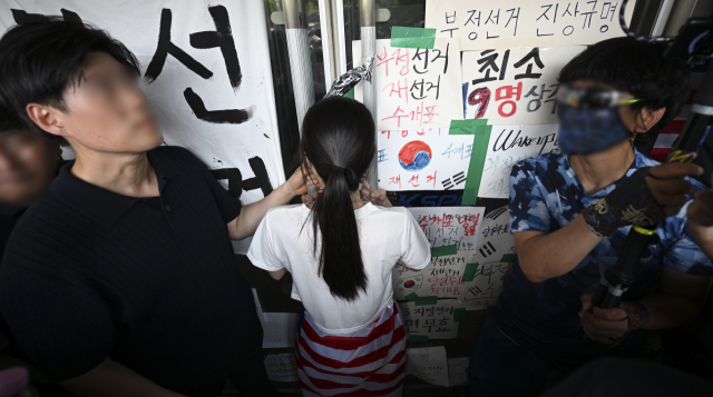 개표소 진입 홀로 막은 '올림픽공원 잔다르크' 누구?